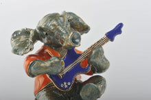 Elephant Playing a Purple Guitar